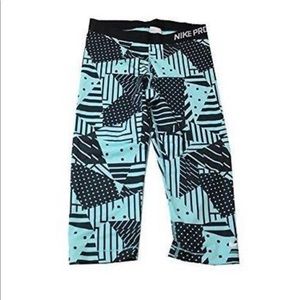 Blue and black Nike Pro Capri leggings